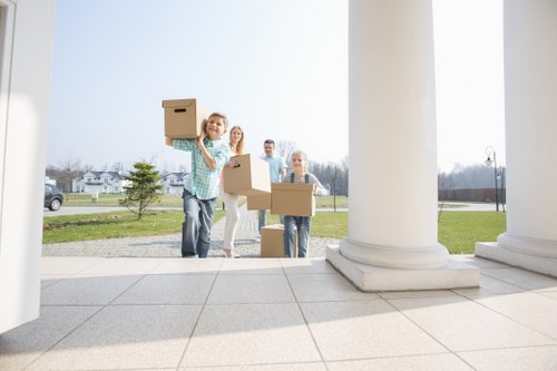 Loading furniture into a van for a north London relocation