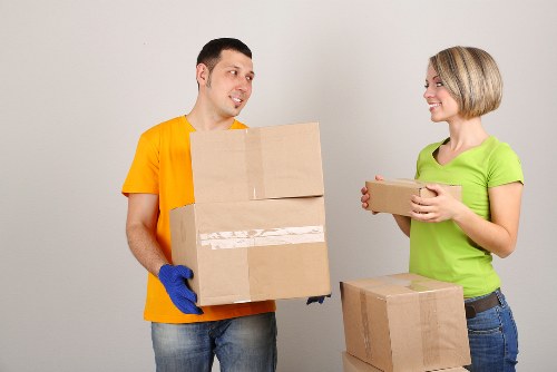 Movers carrying items through a Tufnell Park residential property