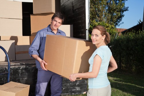 Careful loading of business equipment for transport in north London